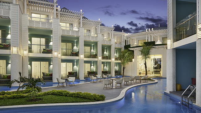 Elegant evening view of rooms and suites at azul beach resort negril jamaica